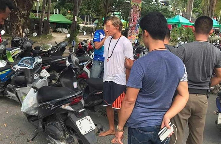 Российский наркоман украл видеокамеру в Таиланде и прыгнул озеро