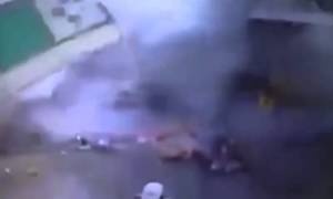Watch: Motorcyclist cheats death by moments as store packed with fireworks explodes