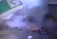 Watch: Motorcyclist cheats death by moments as store packed with fireworks explodes