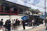 Truck wipes out motorists, shopfronts in Patong ( Ban Patong, Phuket, Thailand )