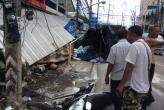 Truck wipes out motorists, shopfronts in Patong ( Ban Patong, Phuket, Thailand )