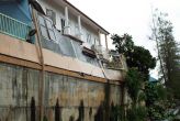 Шесть домов в районе Пхукет-Тауна повреждены оползнем  Сильные дожди размыли грунт в одном из поселков, расположенных рядом с Suan Luang Park, также известным как парк Рамы IX